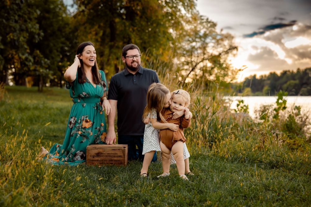 Family with toddler girl with squishy chubby legs.